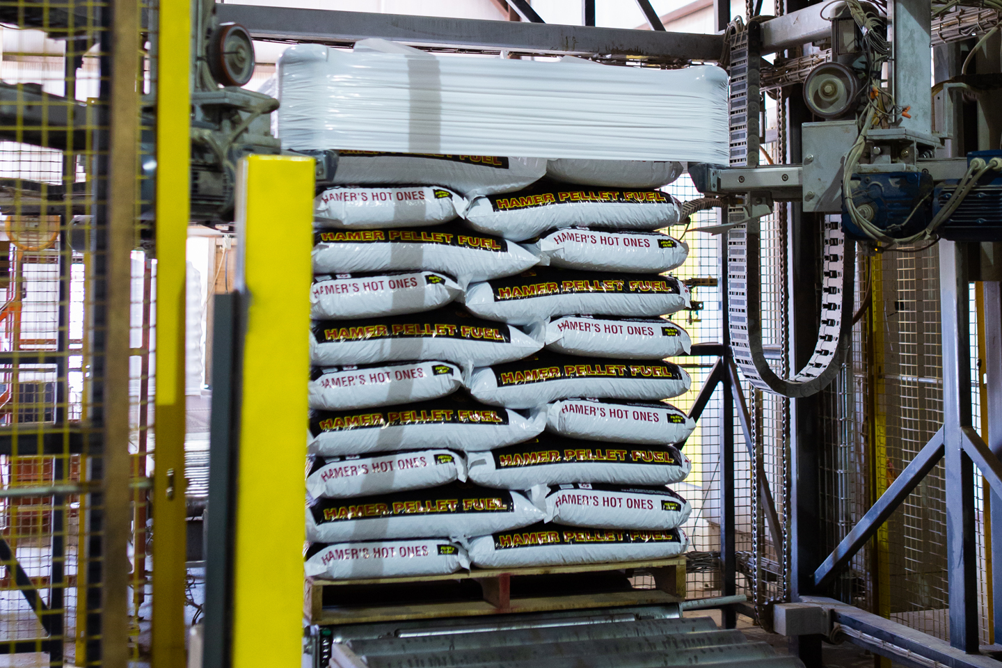 Bags of Hamer's Hot ones being stacked